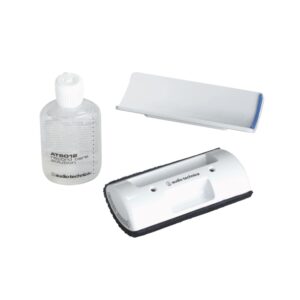 Audio-Technica AT6012(P) Record Care Kit-designed to gently remove contaminates while improving record fidelity and tracking. Contains: Audio-Technica Record Care Solution (2 FL. OZ); Sonic Broom brush pad; storage base; double-sided adhesive tape